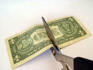 Cutting-money-in-half-Charlotte-Monroe-Mooresville-Divorce-Lawyer-Attorney-300x225