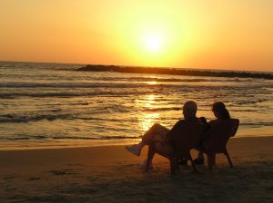 sunset-couple-talking-Charlotte-Monroe-Lake-Norman-Family-Law-Attorney-300x224