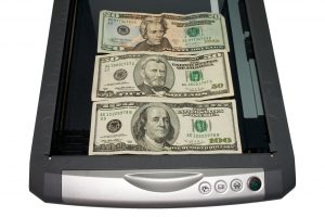 dollars-in-the-scanner-Charlotte-Divorce-Lawyer-300x200