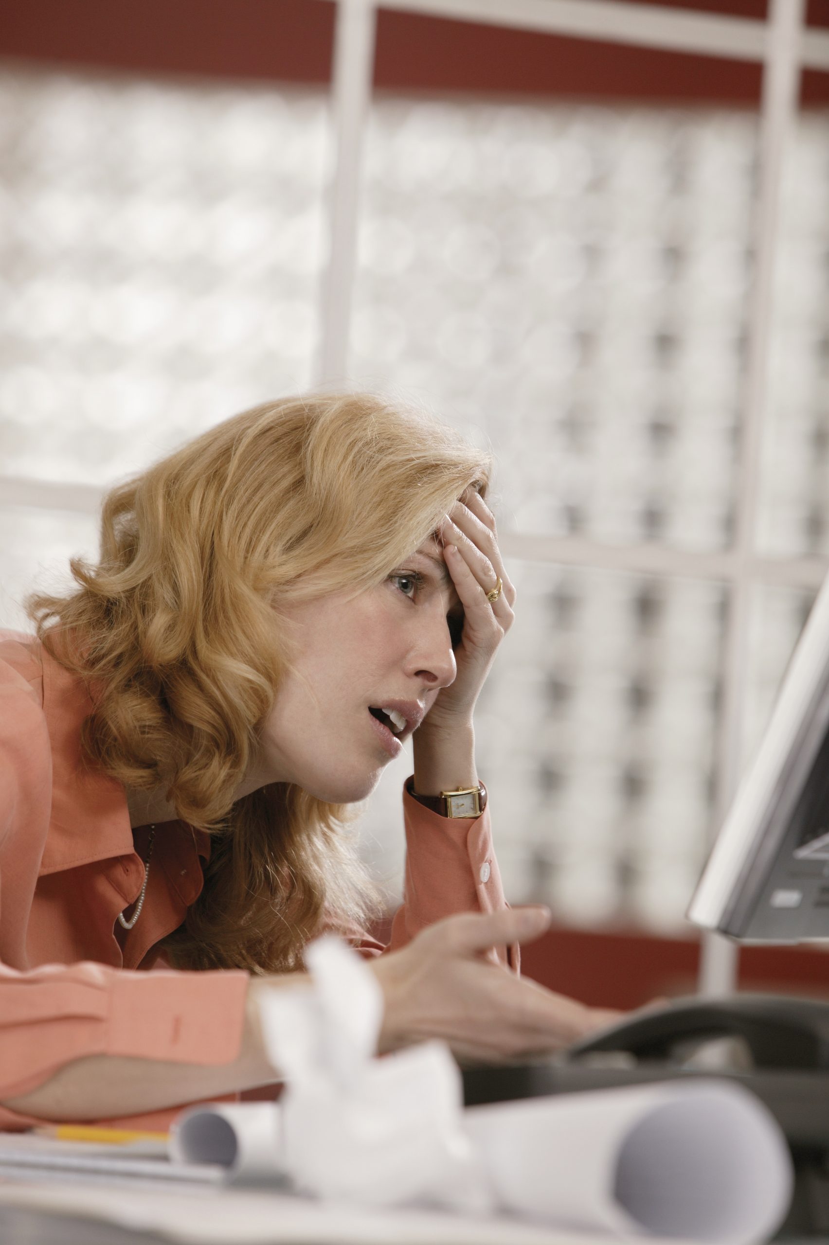 stressed-out-businesswoman-at-computer-1947084-scaled